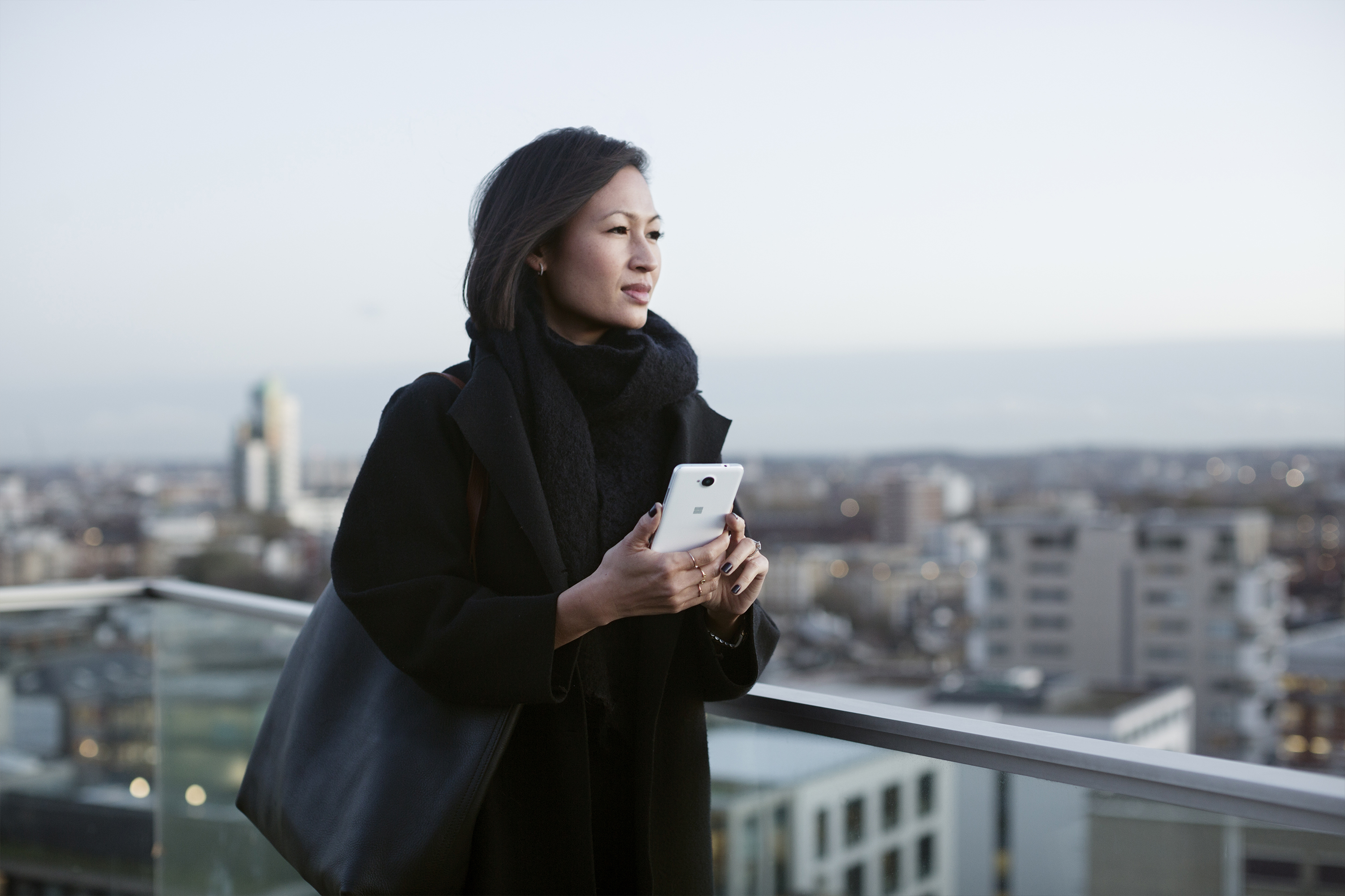 Woman holding Microsoft Lumia smartphone