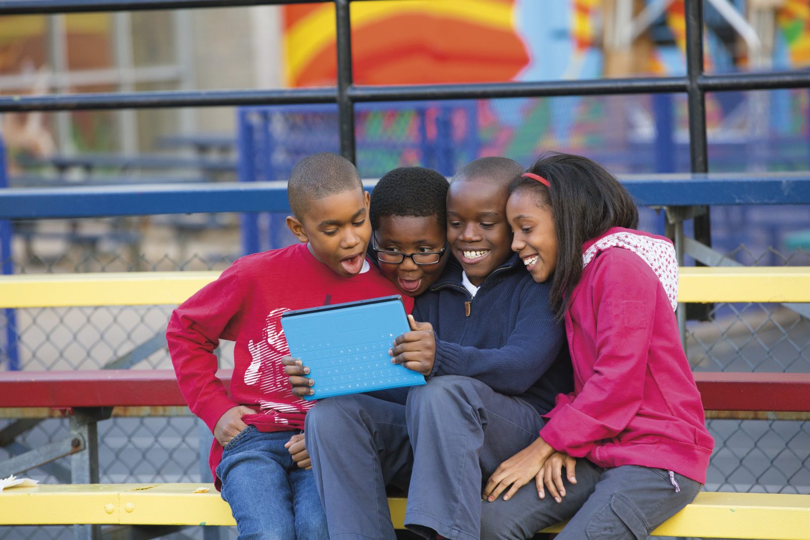 Kids at school watching Microsoft laptop