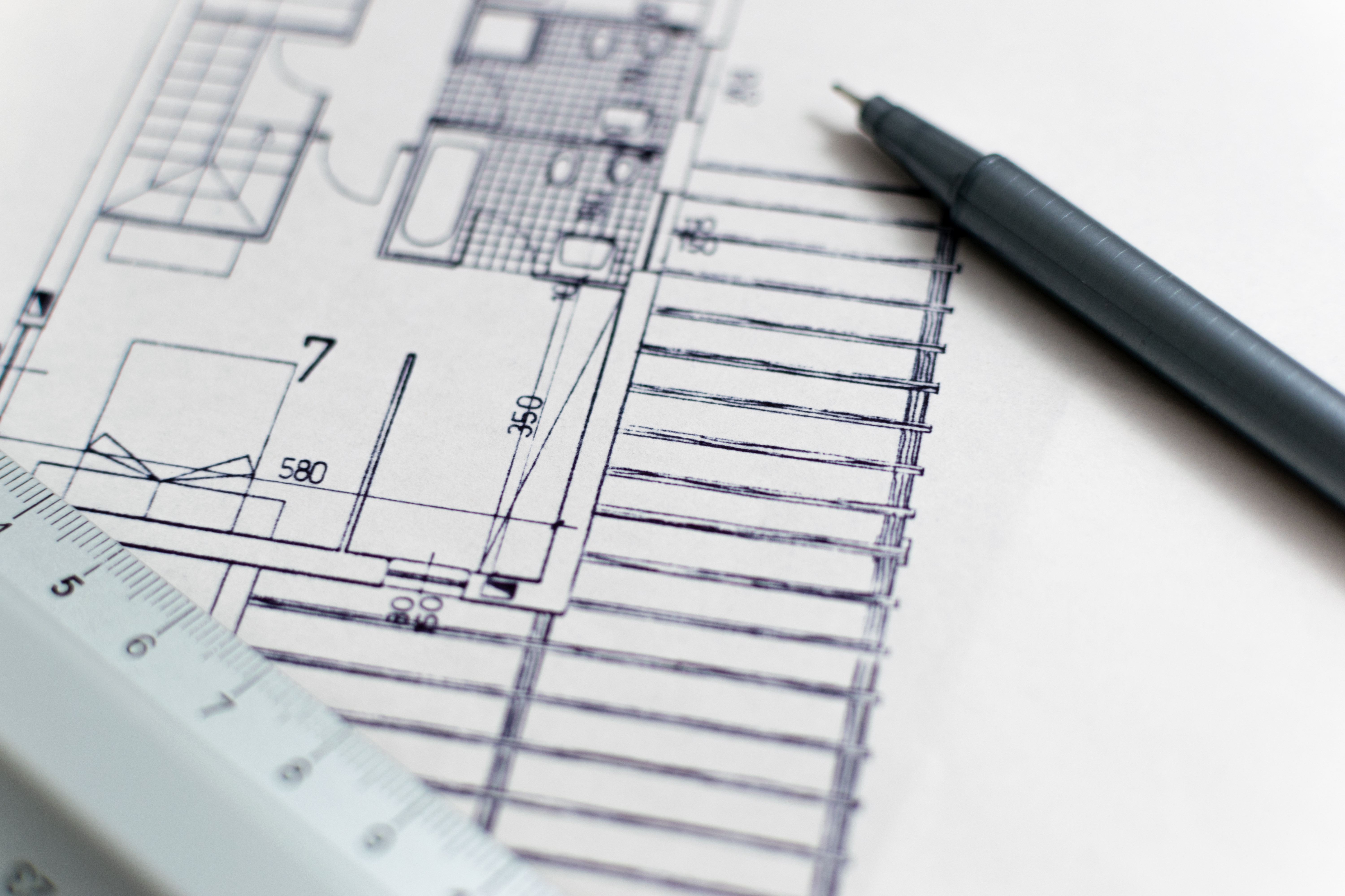 Architecture blueprint with pen and ruler