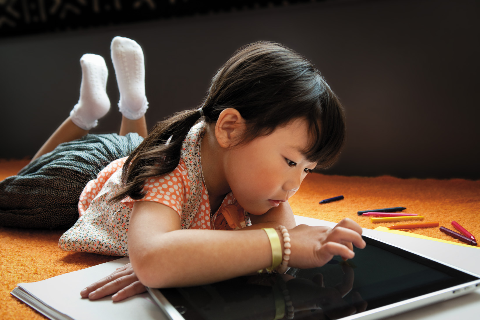 Girl using Microsoft Surface Book