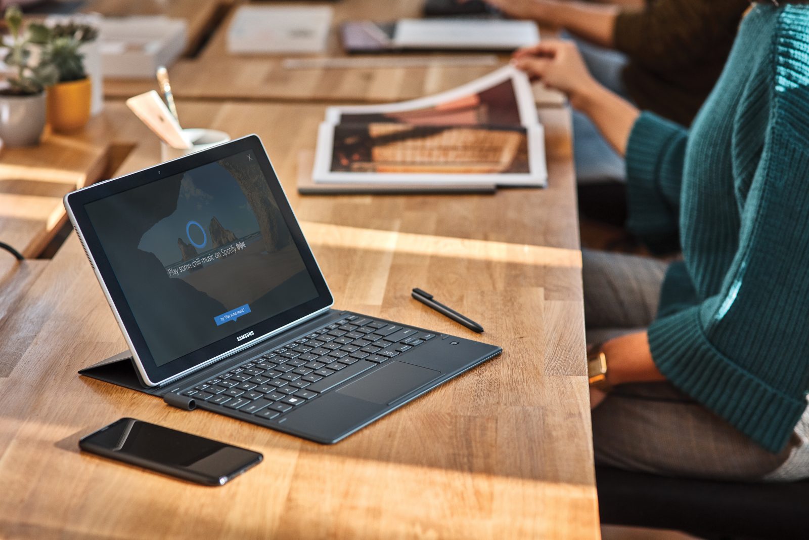 Woman using Cortana on a Microsoft Surface device