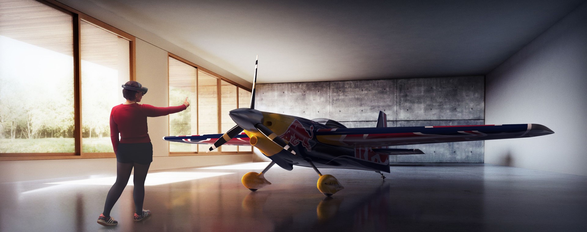 Woman using HoloLens in front of a hologram of a raceplane