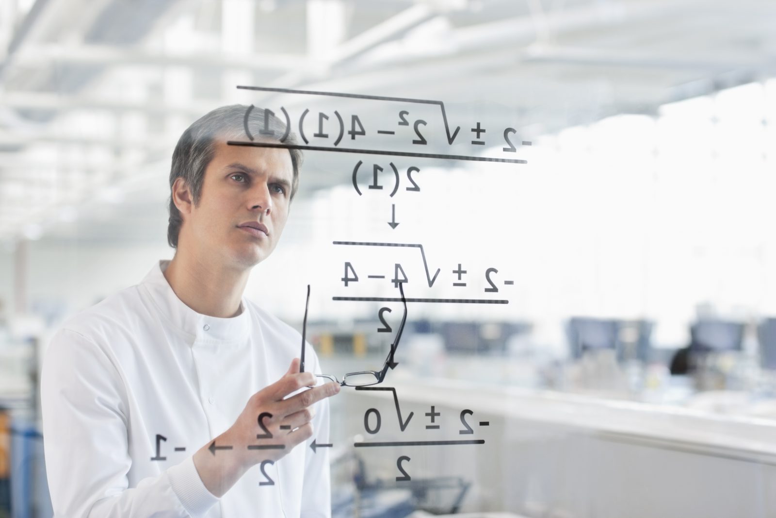 Scientist using touch screen in lab