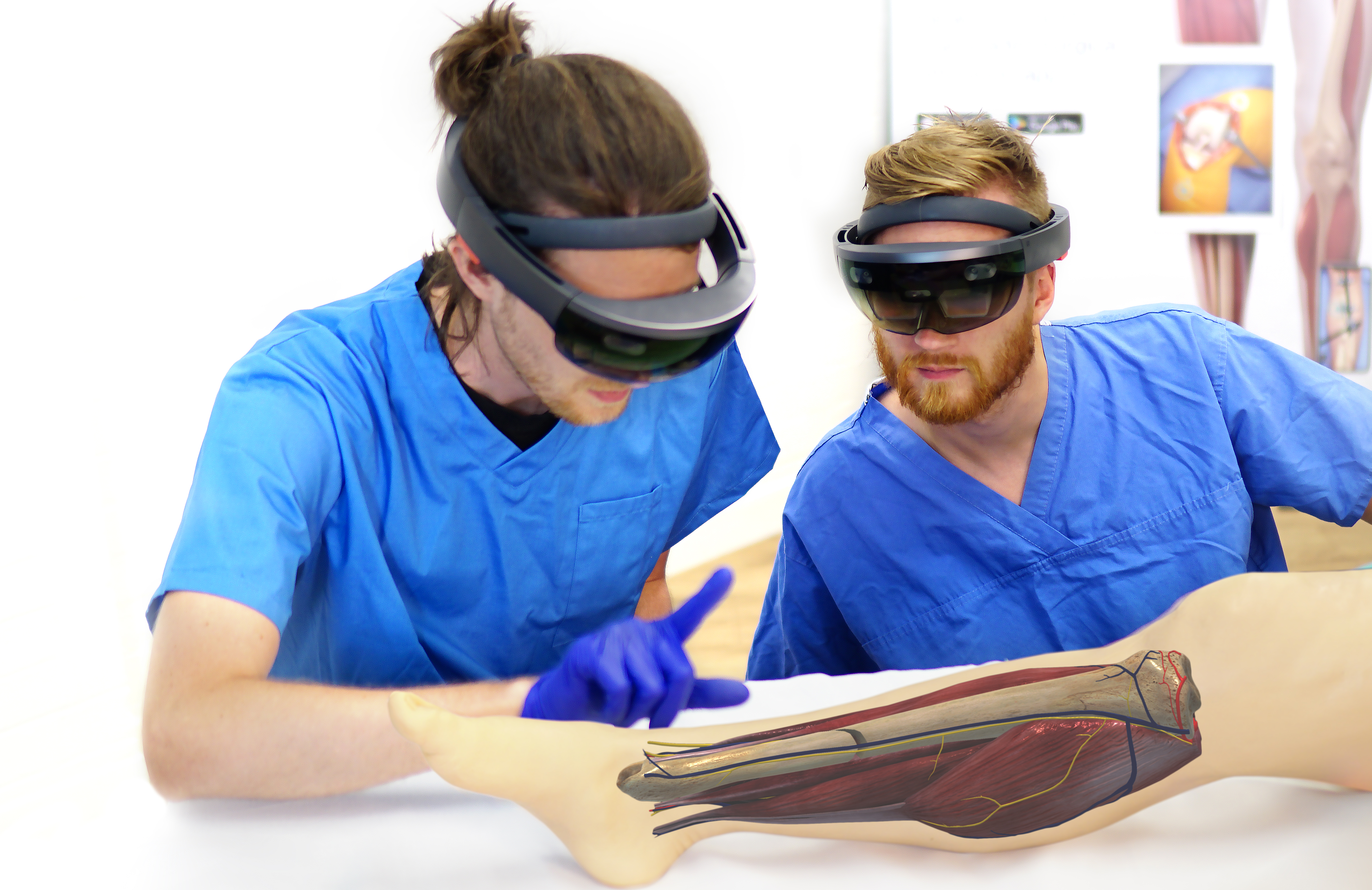 Two surgeons using HoloLens to look at leg during operation