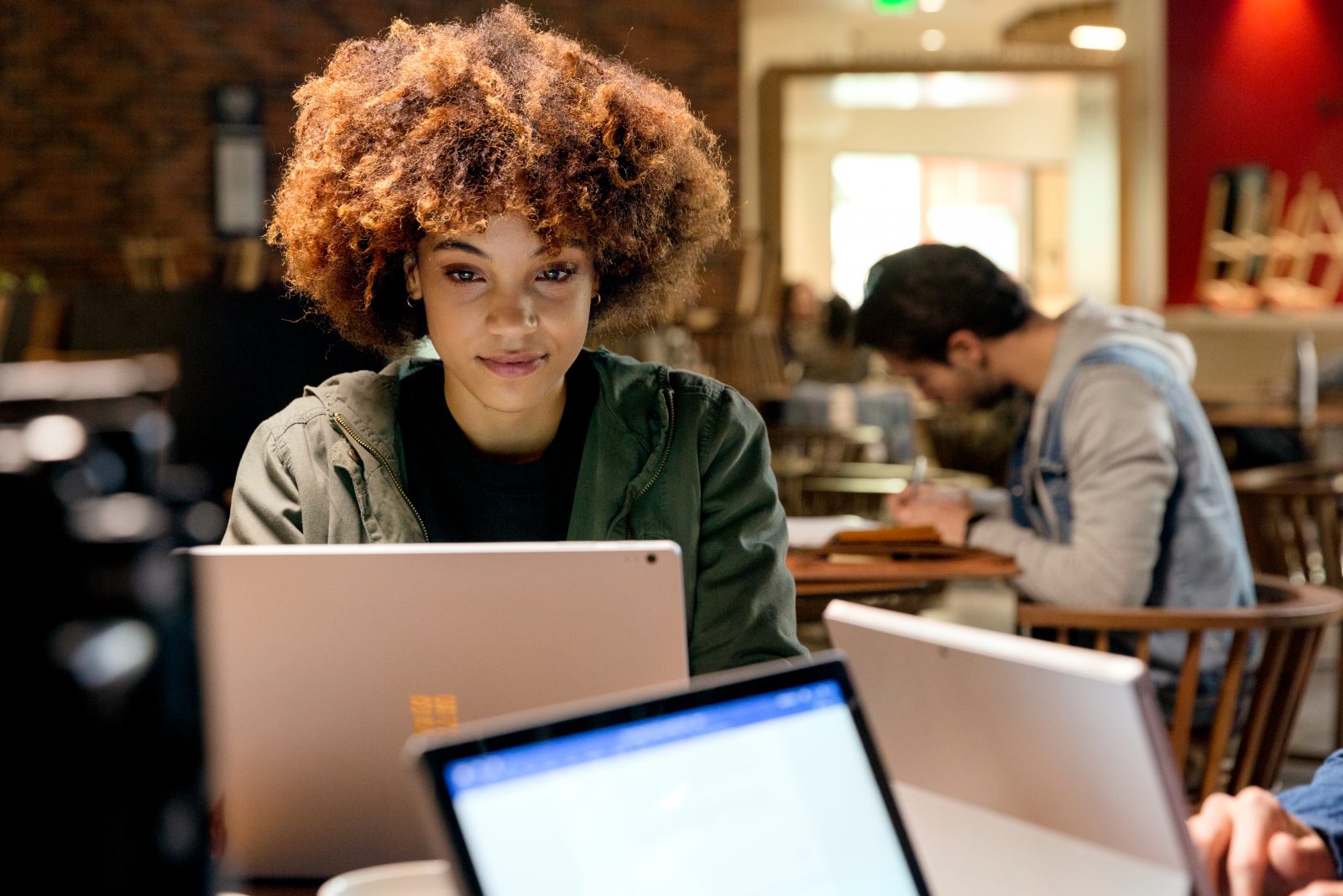 Girl using Surface Laptop at university