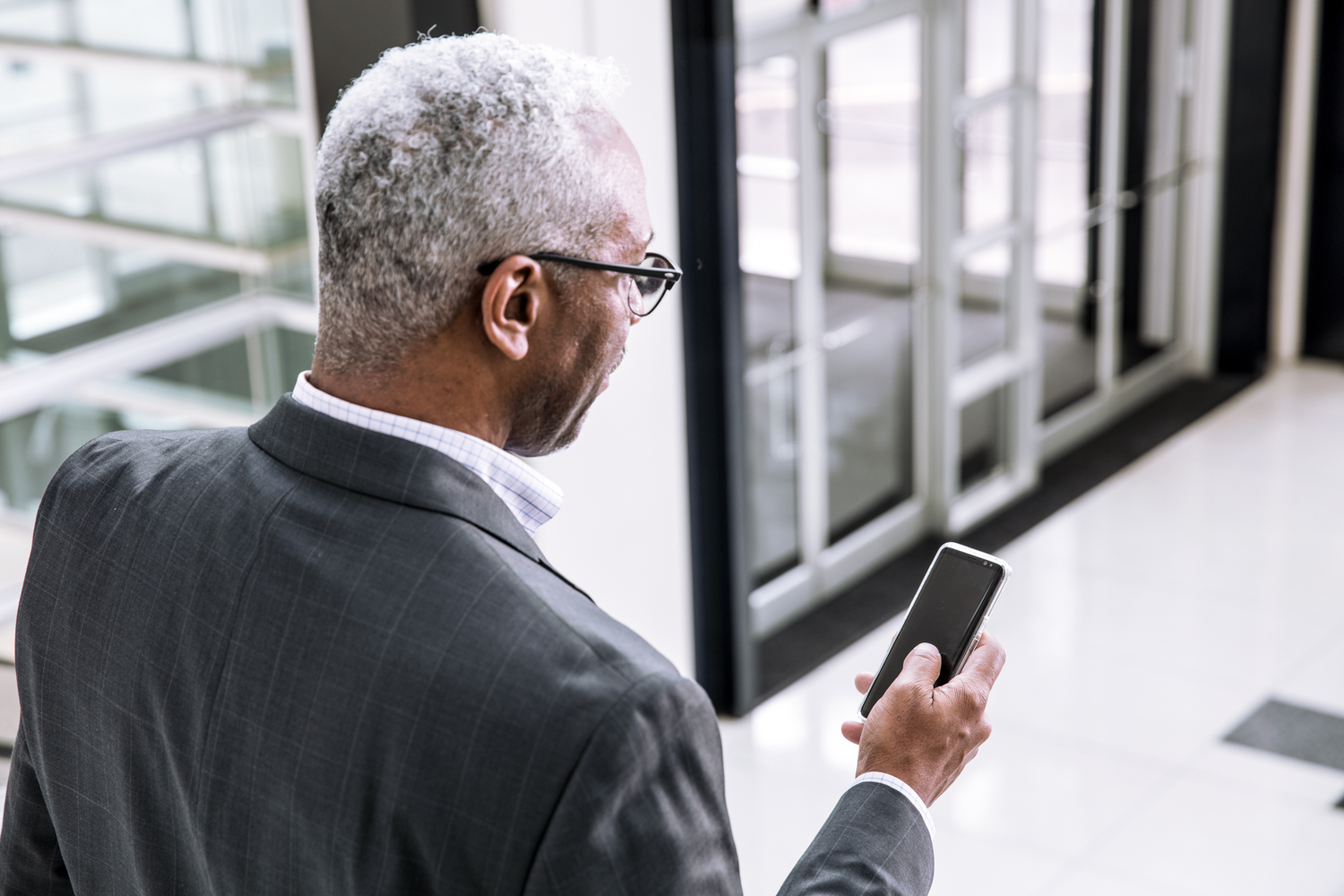 Man using mobile phone in office