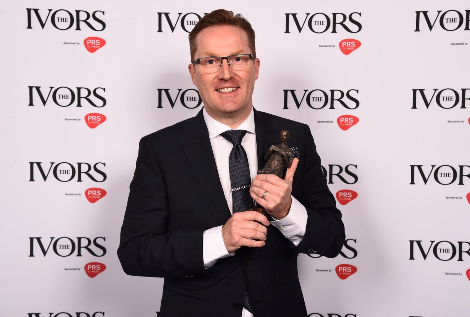 Robin Beanland holds an Ivor Novello Award