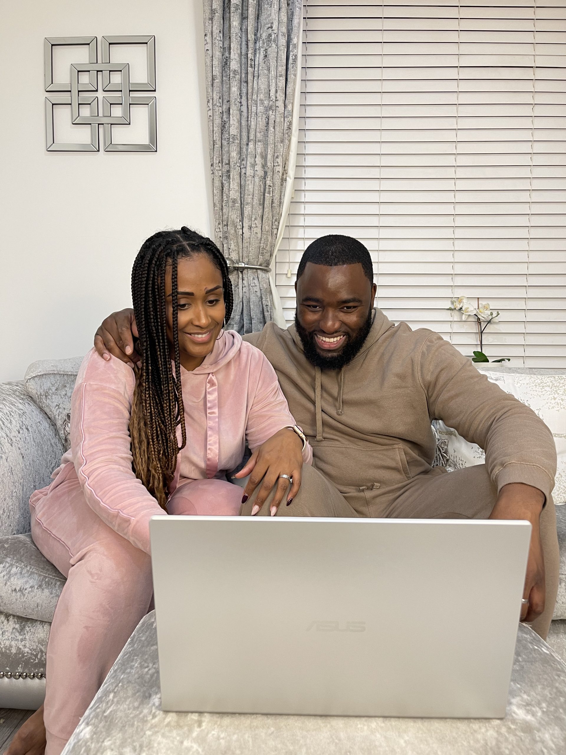 Mr and Mrs Monago on the sofa with a laptop