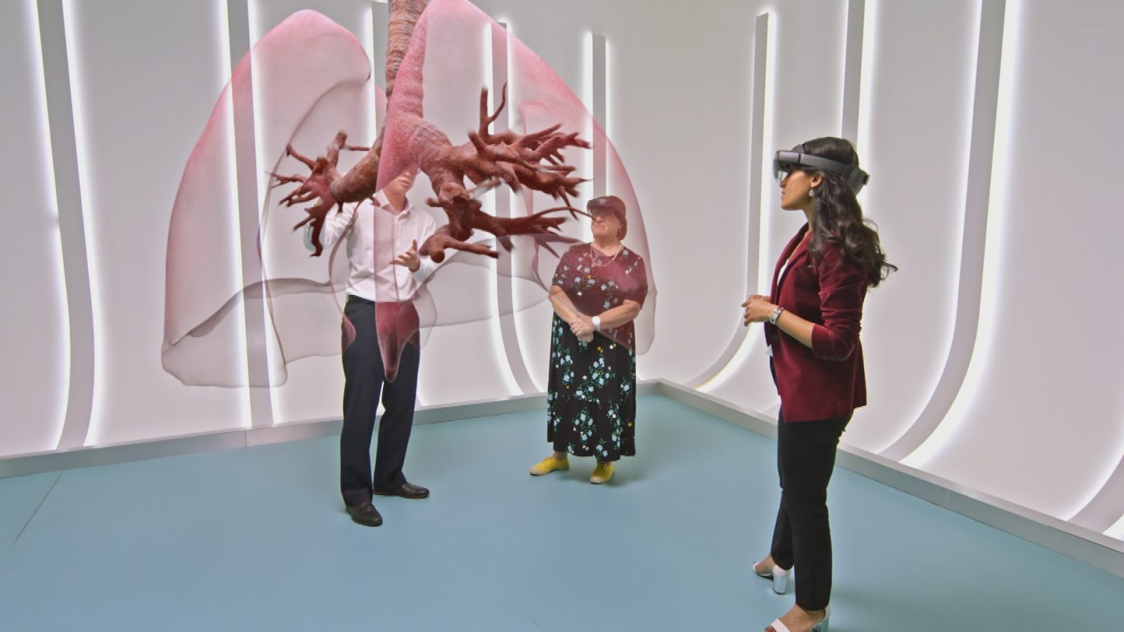 People wearing HoloLens looking at lungs