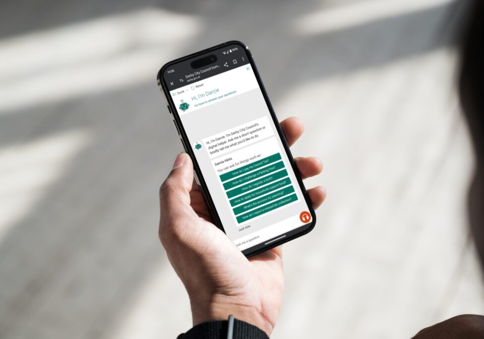 Close up of Derby City Council chatbot Darcie on a smartphone