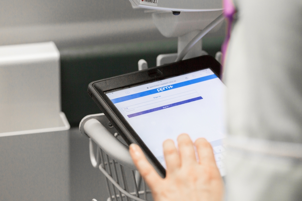 A doctor consulting the electronic patient record on a tablet