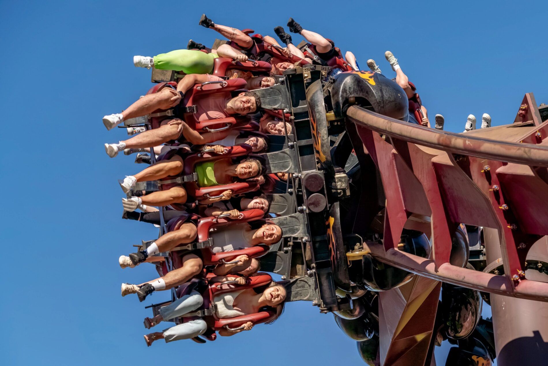 People riding on the Nemesis Inferno rollercoaster at Thorpe Park, England