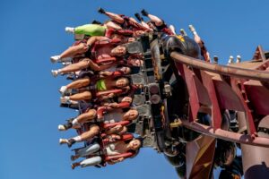 People riding on the Nemesis Inferno rollercoaster at Thorpe Park, England