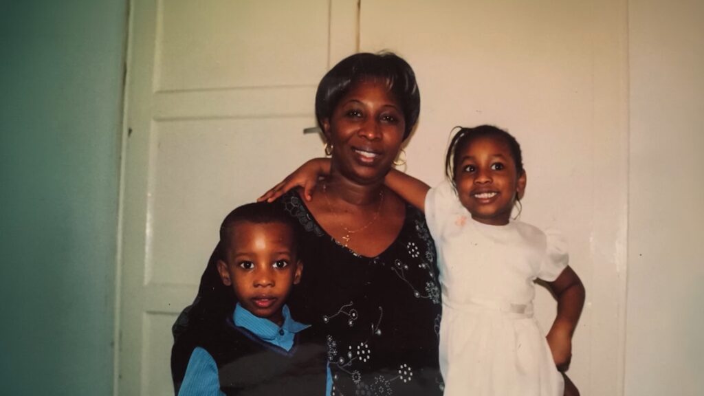 Francis Nwofor (left) as a child with his mother and sister