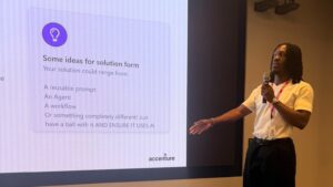 Microsoft Account Technology Specialist Kasheef McLennon presenting at the AI hackathon for young people he organised